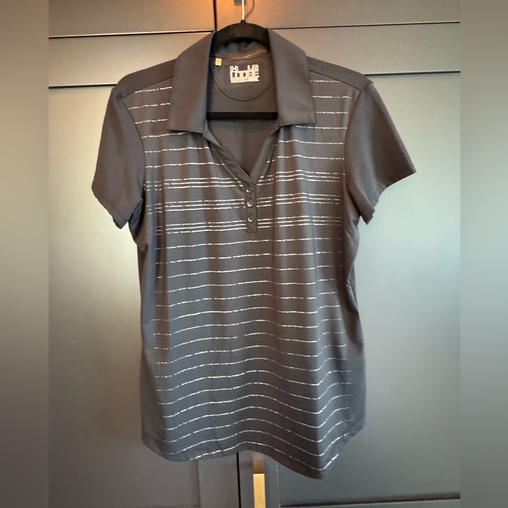 New women’s under armor polo shirt